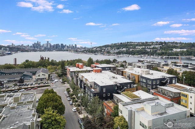 aerial view featuring a water view and a city view