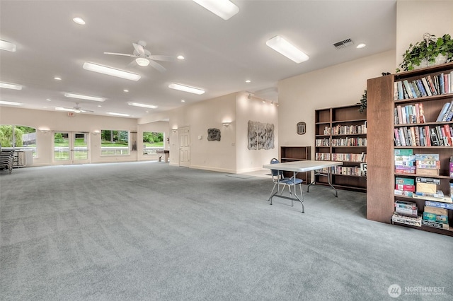 interior space with carpet floors, visible vents, a ceiling fan, and recessed lighting