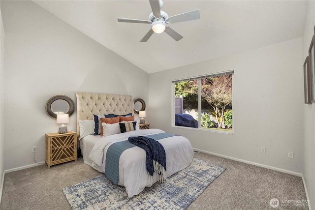 bedroom featuring carpet floors, lofted ceiling, baseboards, and a ceiling fan