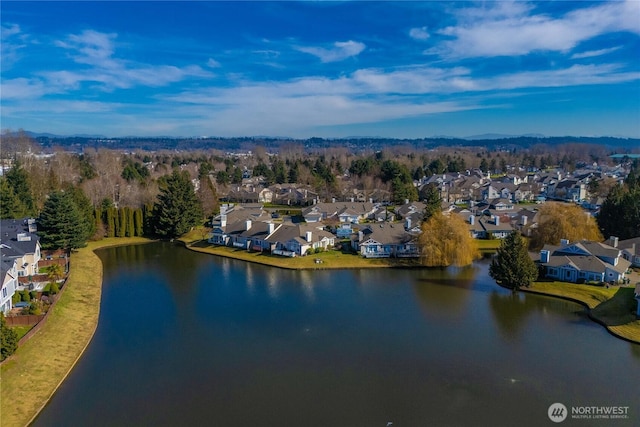 aerial view with a water view and a residential view