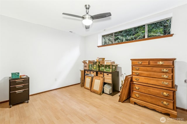 misc room featuring visible vents, ceiling fan, baseboards, and light wood-style floors