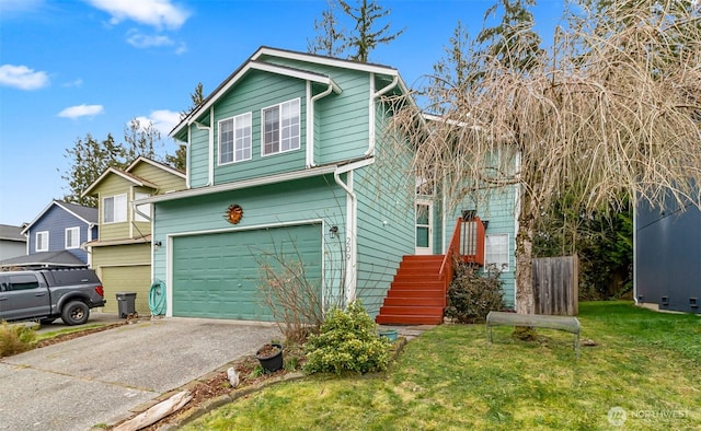 view of front of house featuring a garage, concrete driveway, and a front lawn