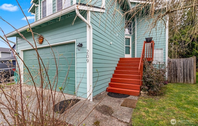 garage with fence