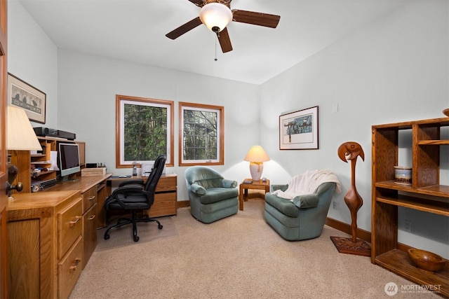 office area featuring carpet flooring, baseboards, and ceiling fan