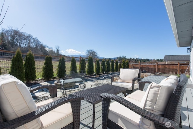 view of patio featuring a fenced backyard and outdoor lounge area