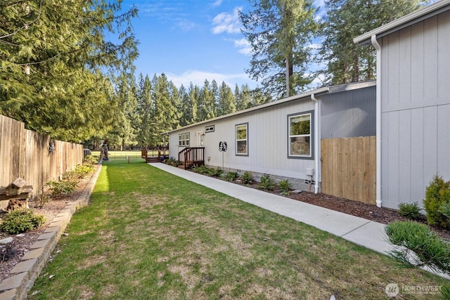 view of yard with fence