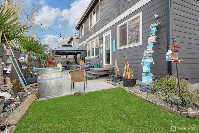 view of yard featuring a patio area and a gazebo