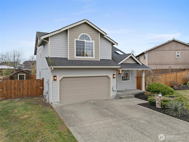 view of front of house with a garage, fence, concrete driveway, and roof with shingles