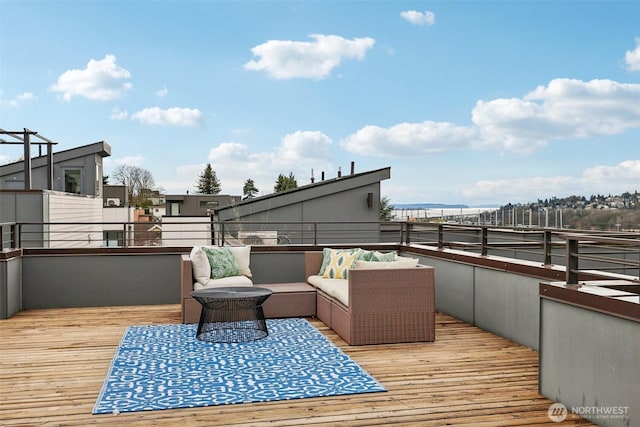 wooden terrace featuring outdoor lounge area