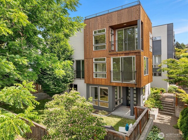 3252 14th Ave W, Seattle, WA 98119 - back of house with a balcony