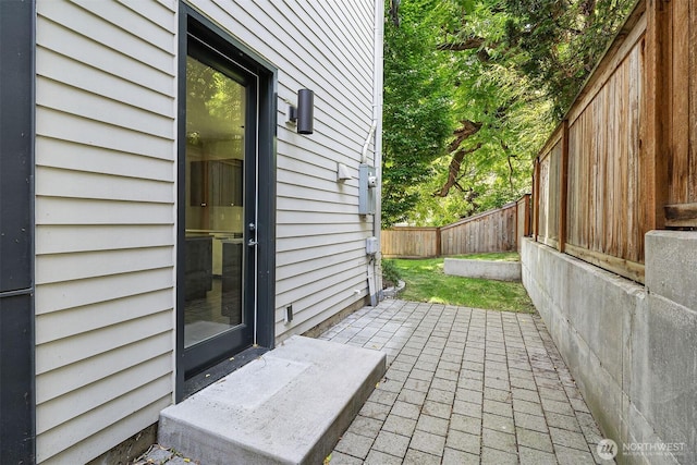 3252 14th Ave W, Seattle, WA 98119 - fenced backyard with a patio