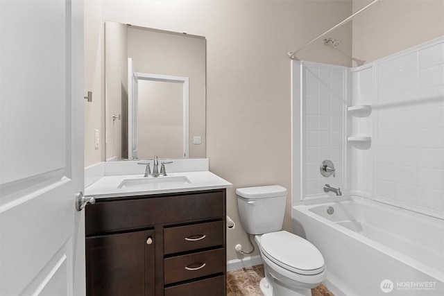 bathroom with vanity, shower / tub combination, and toilet