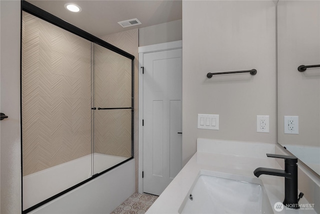 full bath featuring recessed lighting, visible vents, shower / bath combination with glass door, and vanity