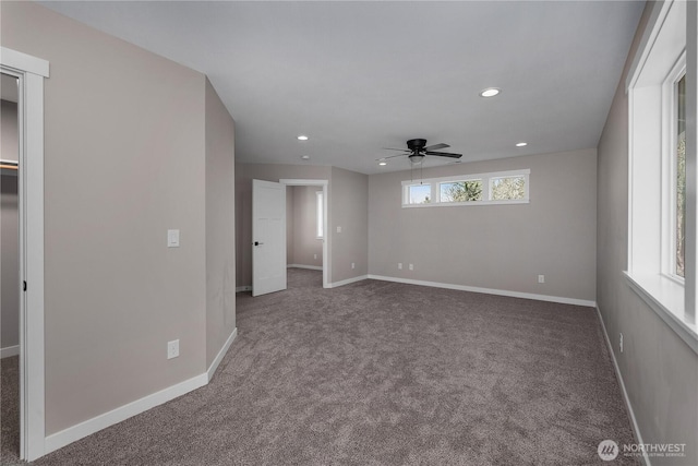 unfurnished room with recessed lighting, carpet flooring, and baseboards