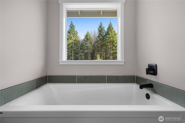 full bathroom with a garden tub