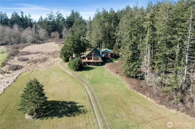 bird's eye view featuring a forest view