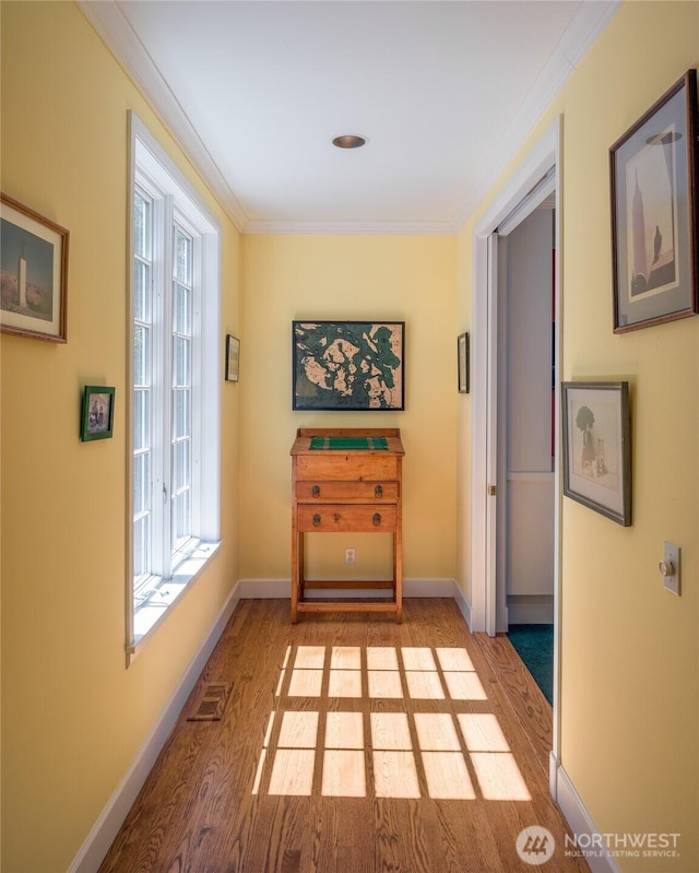 373 Eliza Rd, Lopez Island, WA 98261 - corridor with wood finished floors and ornamental molding
