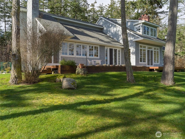 373 Eliza Rd, Lopez Island, WA 98261 - view of front of home with a chimney and a front yard