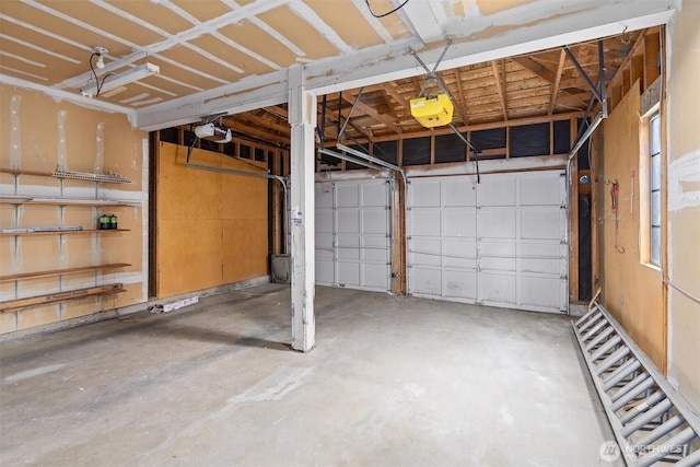 garage featuring a garage door opener