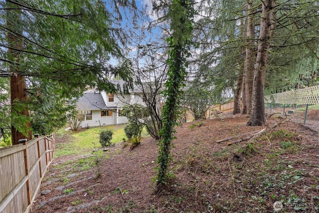 view of yard featuring a fenced backyard