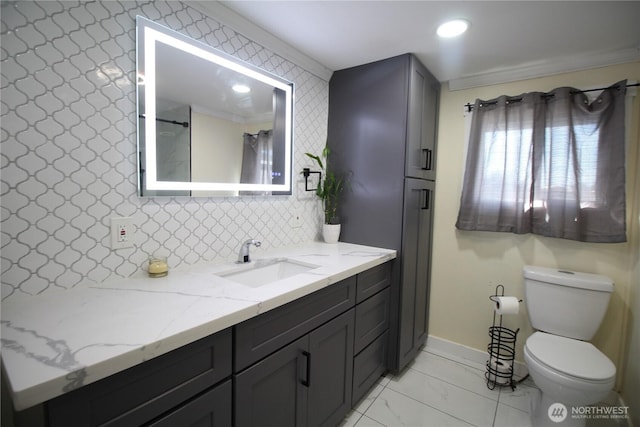 full bathroom featuring toilet, marble finish floor, vanity, backsplash, and recessed lighting