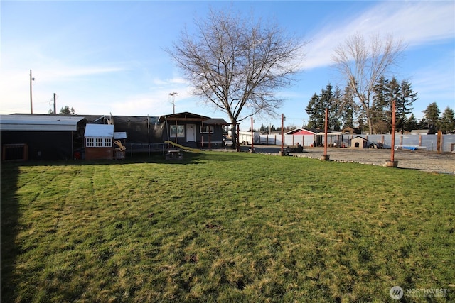 view of yard featuring a trampoline