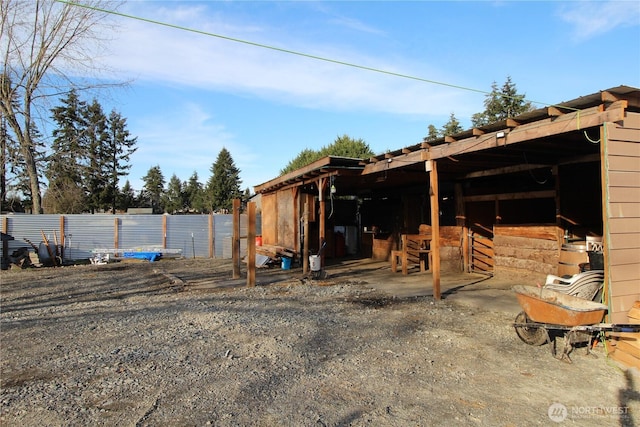 view of yard with an outdoor structure and an exterior structure