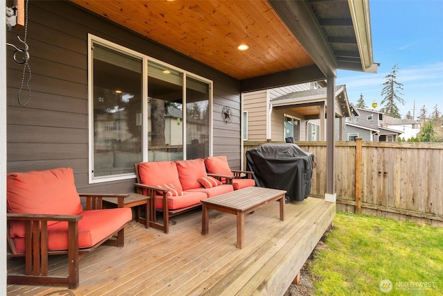 deck with fence and grilling area