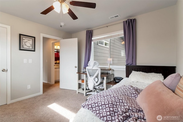 bedroom with a ceiling fan, baseboards, visible vents, and carpet floors