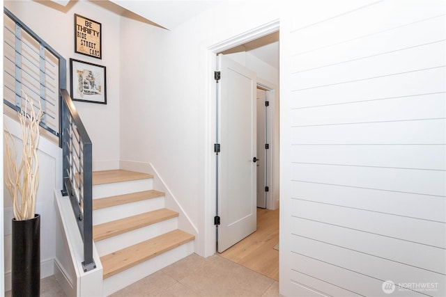 staircase with tile patterned flooring