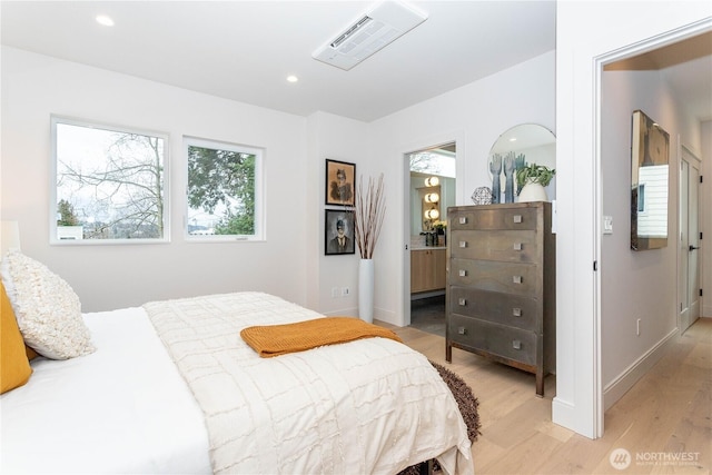 bedroom featuring light wood-type flooring, visible vents, and recessed lighting