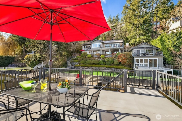 view of patio featuring outdoor dining area