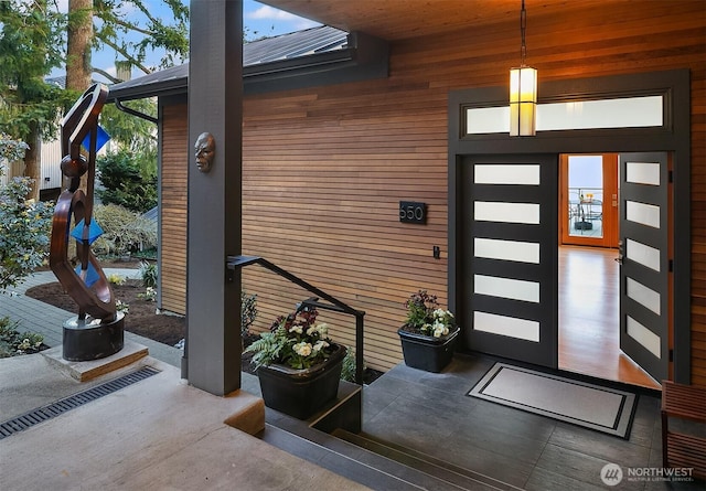 property entrance with metal roof