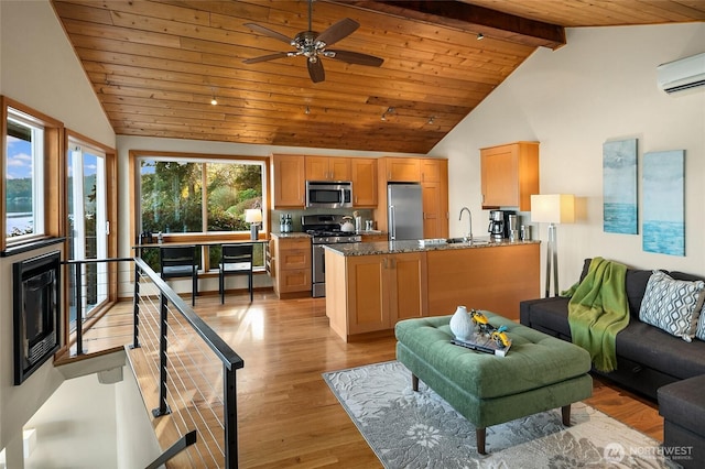 living room with light wood-type flooring, beamed ceiling, high vaulted ceiling, a wall unit AC, and wood ceiling