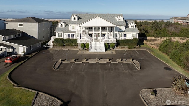 birds eye view of property with a residential view