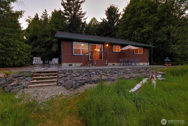 730 E N Bay Rd, Allyn, WA 98524 - back of property featuring a patio area