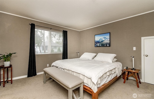 bedroom with crown molding, baseboards, and light carpet