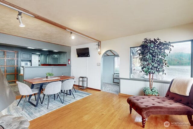 dining space with light wood-style floors