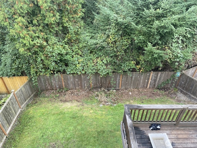 view of yard featuring a fenced backyard