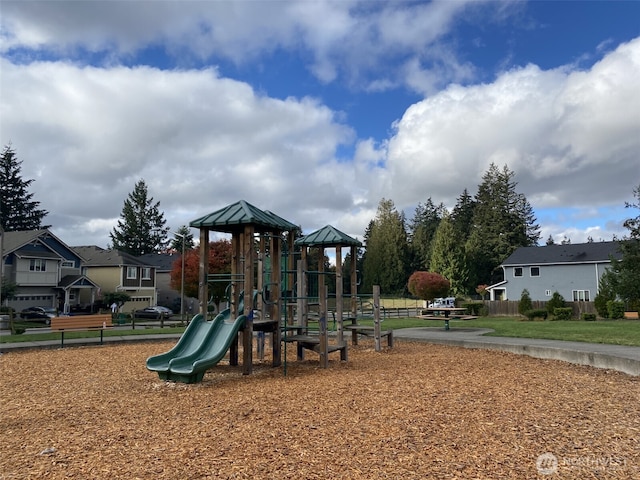 community play area with a residential view