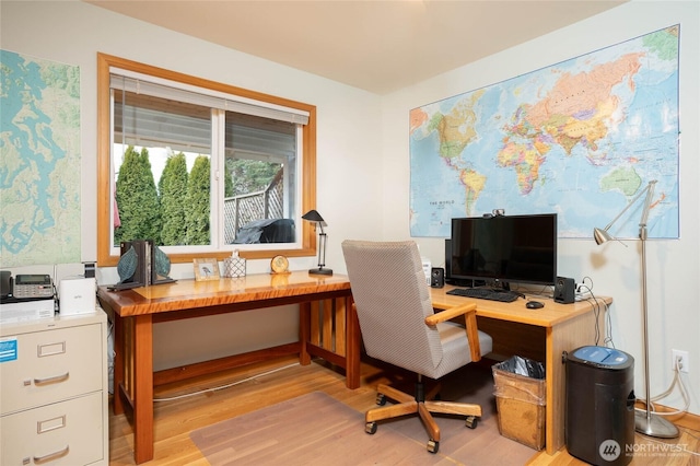 office area with wood finished floors