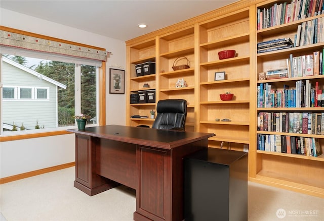 office space with recessed lighting, light carpet, and baseboards