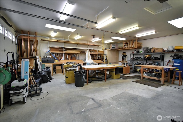 garage with a workshop area