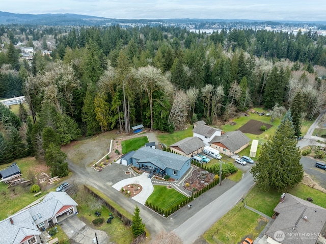 aerial view featuring a view of trees