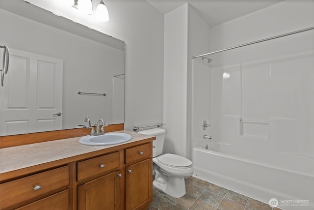 full bath with vanity, bathing tub / shower combination, and toilet