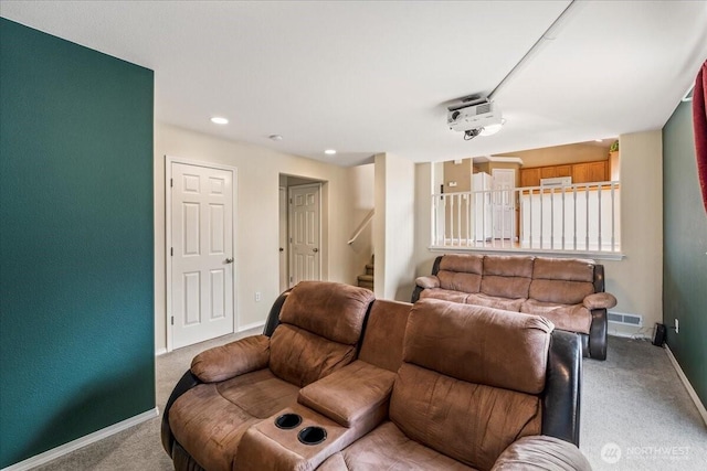 living area featuring visible vents, recessed lighting, stairway, carpet flooring, and baseboards