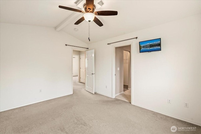 spare room with light colored carpet, baseboards, lofted ceiling with beams, and ceiling fan