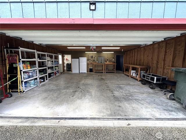 garage with freestanding refrigerator