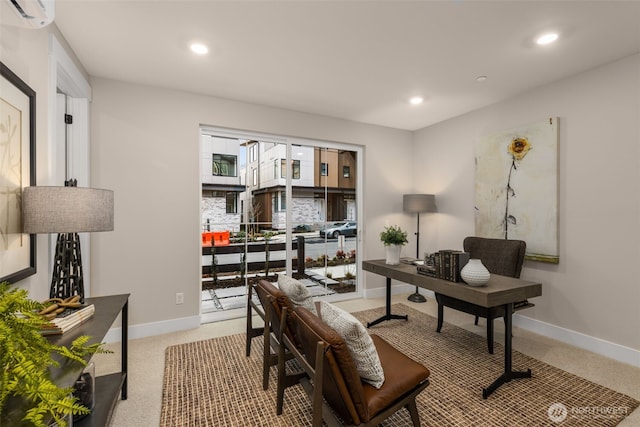 office area featuring a wall mounted AC, light colored carpet, and recessed lighting