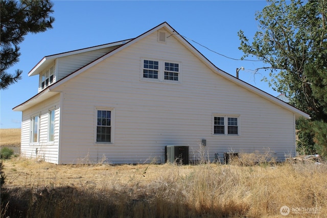 view of home's exterior featuring central AC unit